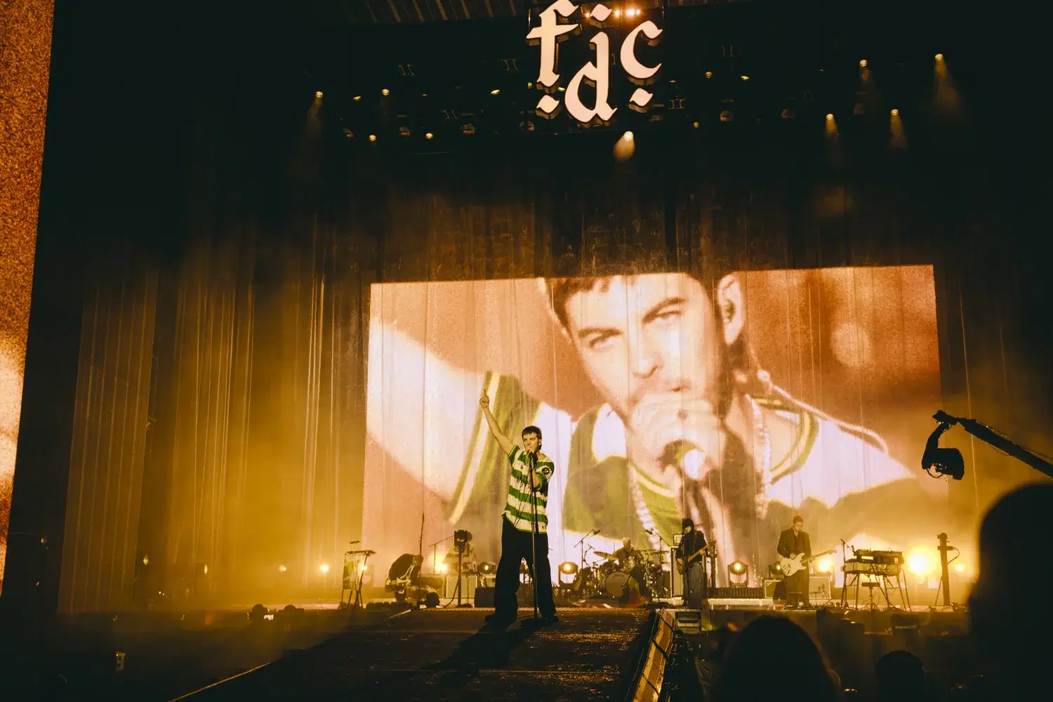 Grian Chatten of Fontaines D.C. headlining Reading Festival, 28 August 2026, wearing the Cwmbran Celtic Mogwai shirt