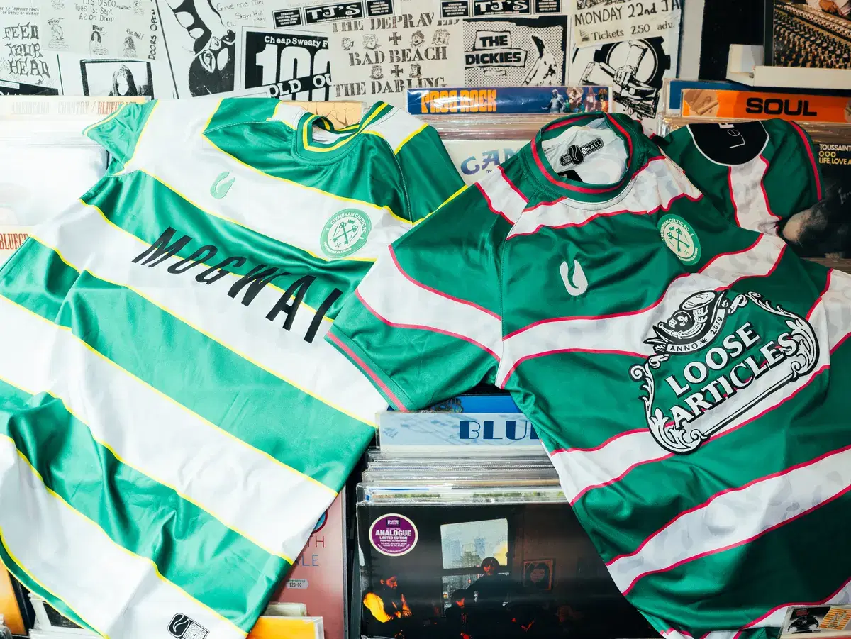 The Mogwai and Loose Articles shirts against the gig-poster wall
